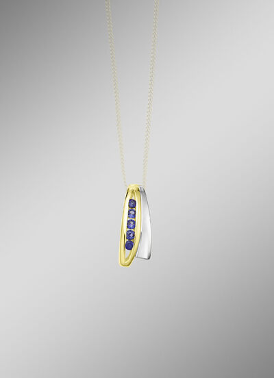 Anhänger in Bicolor mit synth. Safir 