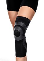 Kniebandage mit integrierten Tapes 