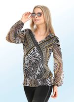 Fantasievolles Shirt mit gesmoktem Saumabschluss 