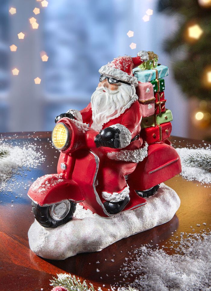 Beleuchteter Samichlaus auf Roller 