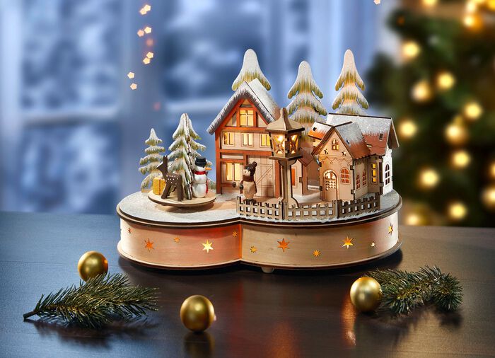 Beleuchtete Winterszene aus Holz 